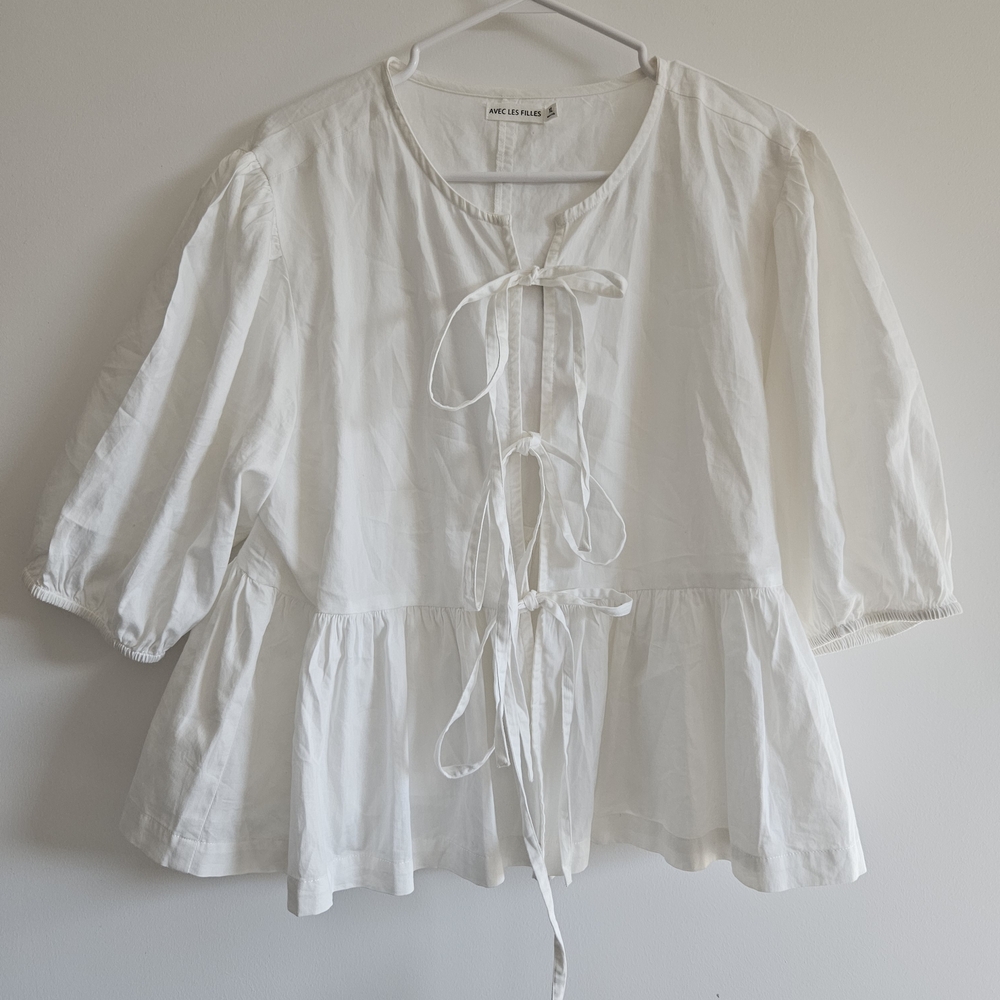 White Peplum Top